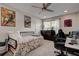 Comfortable bedroom featuring a bed, desk, and ample natural light from the window at 6279 Lucille Dr # B, North Charleston, SC 29406