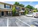 Exterior of a two story brick apartment complex with parking in front and shade trees at 6279 Lucille Dr # B, North Charleston, SC 29406