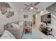 Spacious living room with a large TV, hardwood floors, and comfortable seating at 6279 Lucille Dr # B, North Charleston, SC 29406