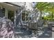 Outdoor living space featuring a well-maintained back deck with comfortable seating and lovely home exterior at 700 Preservation Pl, Mount Pleasant, SC 29464