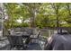 Outdoor deck with comfortable seating and a grill, perfect for entertaining at 700 Preservation Pl, Mount Pleasant, SC 29464