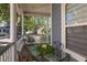 Cozy front porch featuring a table and chairs for enjoying the outdoors at 700 Preservation Pl, Mount Pleasant, SC 29464