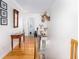 Hallway with wood floors, deer mounts, and decorative table at 700 Preservation Pl, Mount Pleasant, SC 29464
