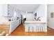 Modern kitchen with light blue cabinets, stainless steel appliances, and a breakfast bar at 700 Preservation Pl, Mount Pleasant, SC 29464