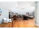 Spacious living area with hardwood floors, plenty of seating, and natural light at 700 Preservation Pl, Mount Pleasant, SC 29464