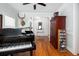 Stunning music room featuring a piano, hardwood floors, and decorative accents at 700 Preservation Pl, Mount Pleasant, SC 29464
