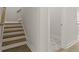 Staircase featuring wood steps and luxury vinyl flooring at 753 Maynard Ln, Summerville, SC 29486
