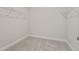 Walk-in closet with wire shelving and carpeted floors at 753 Maynard Ln, Summerville, SC 29486