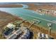 Breathtaking aerial view featuring waterfront properties, community boat docks, and scenic waterway vistas at 81 Sandbar Ln # 19, Folly Beach, SC 29439