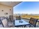 Outdoor deck with seating offering serene views of the marsh and waterway at 81 Sandbar Ln # 19, Folly Beach, SC 29439