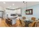 Bright, inviting kitchen with island, breakfast nook and barstool seating at 81 Sandbar Ln # 19, Folly Beach, SC 29439