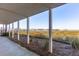 Covered patio area offering marsh and waterfront views at 81 Sandbar Ln # 19, Folly Beach, SC 29439