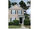 Charming two-story townhome with black shutters and a cozy entrance at 9010 Maple Grove Dr, Summerville, SC 29485
