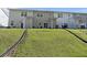 Expansive backyard with a gentle slope, offering plenty of space for outdoor activities at 9105 Parlor Dr, Ladson, SC 29456