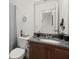 Cozy bathroom featuring a granite-topped vanity, toilet, and essential fixtures at 9105 Parlor Dr, Ladson, SC 29456