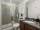 Modern bathroom featuring a glass shower and granite vanity at 9105 Parlor Dr, Ladson, SC 29456