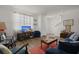 Bright living room with stylish decor, comfortable seating, and abundant natural light at 9105 Parlor Dr, Ladson, SC 29456