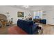 Relaxing living room featuring a comfortable sofa and inviting decor at 9105 Parlor Dr, Ladson, SC 29456