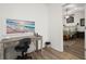 Cozy home office featuring a wooden desk and calming beach-themed artwork at 9105 Parlor Dr, Ladson, SC 29456