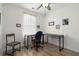 Bright home office with twin work areas, wood-look flooring and natural light at 9105 Parlor Dr, Ladson, SC 29456