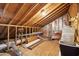 Unfinished attic with wood beam frame at 10 Skyeman Dr, Charleston, SC 29414