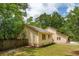 View of backyard featuring manicured lawn and privacy fence at 10 Skyeman Dr, Charleston, SC 29414