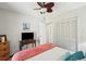 Bright bedroom features a ceiling fan and closet at 10 Skyeman Dr, Charleston, SC 29414