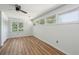 Well-lit room features laminate flooring, closet, and light blue paint at 10 Skyeman Dr, Charleston, SC 29414