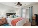 Charming bedroom featuring coastal decor, a ceiling fan, and lots of natural light from the window at 10 Skyeman Dr, Charleston, SC 29414