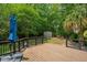 Wood deck overlooking the backyard, greenery, and tool shed at 10 Skyeman Dr, Charleston, SC 29414