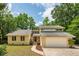 Inviting single-Gathering home featuring lush landscaping and a two-car garage at 10 Skyeman Dr, Charleston, SC 29414