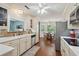 Classic kitchen with stainless steel appliances, white cabinets and a breakfast nook at 10 Skyeman Dr, Charleston, SC 29414