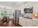 Bright kitchen features stainless steel appliances and an eat in breakfast nook area at 10 Skyeman Dr, Charleston, SC 29414