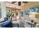 Inviting screened porch with comfortable seating and views of the lush backyard and beautiful decor at 10 Skyeman Dr, Charleston, SC 29414