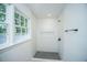 Bright bathroom featuring tiled shower, black shower fixtures, and a large window at 100 Colonial Dr, Goose Creek, SC 29445
