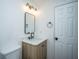 Charming bathroom featuring a vanity with a marble countertop and a modern faucet at 100 Colonial Dr, Goose Creek, SC 29445