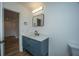 Modern bathroom vanity, mirror, and fixtures at 100 Colonial Dr, Goose Creek, SC 29445