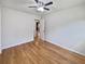 Bedroom featuring hardwood floors, ceiling fan, with an open doorway at 102 Rebellion Rd, Summerville, SC 29483