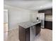 Bright kitchen with granite countertops, stainless steel appliances, and a functional island with a sink, ideal for cooking at 102 Rebellion Rd, Summerville, SC 29483