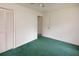 Bedroom with a closet on the left, a ceiling fan, and an open doorway to another room at 104 Belmont Ct, Ladson, SC 29456