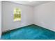Bedroom with plush carpeting, white walls, and natural light from the window at 104 Belmont Ct, Ladson, SC 29456