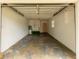 Empty garage shows potential for storage and a small window bringing in natural light at 104 Belmont Ct, Ladson, SC 29456