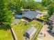 Aerial view of a backyard with a play area, garden, tool shed, and a refreshing in-ground swimming pool at 104 Greensboro Ln, Ladson, SC 29456