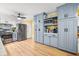 A modern kitchen with stainless steel appliances, tile backsplash and custom cabinetry at 104 Greensboro Ln, Ladson, SC 29456