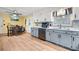 Spacious eat-in kitchen with stainless steel appliances and ample cabinet storage at 104 Greensboro Ln, Ladson, SC 29456