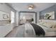 Comfortable bedroom with stylish decor, carpet flooring, and plenty of natural light at 1059 Sago Palm Ct, Mount Pleasant, SC 29429