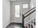 Entryway featuring a staircase and a door with glass at 1059 Sago Palm Ct, Mount Pleasant, SC 29429