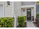 Close-up of front door, house number, and well maintained front entrance at 1059 Sago Palm Ct, Mount Pleasant, SC 29429
