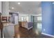 Open-concept kitchen boasts granite countertops and a central island with eat-in breakfast bar at 1059 Sago Palm Ct, Mount Pleasant, SC 29429