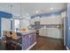 Kitchen featuring a large island with seating, stainless steel appliances, and custom backsplash at 1059 Sago Palm Ct, Mount Pleasant, SC 29429